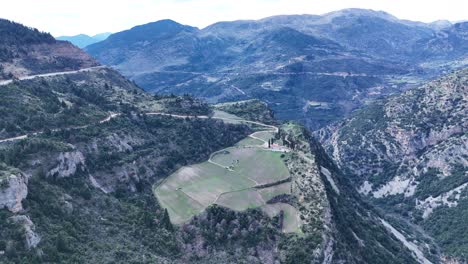 Drone-shot-of-a-small-farm-hidden-in-the-mountains-|-4K-60fps