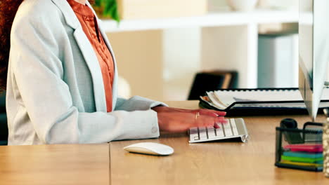 lawyer hands typing on a computer keyboard