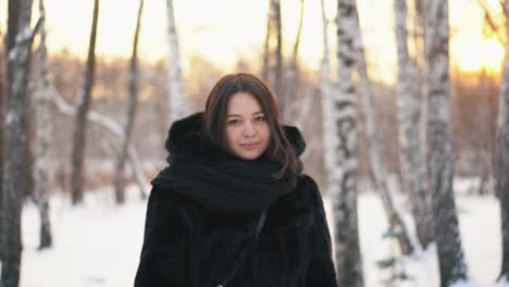 woman in a winter forest