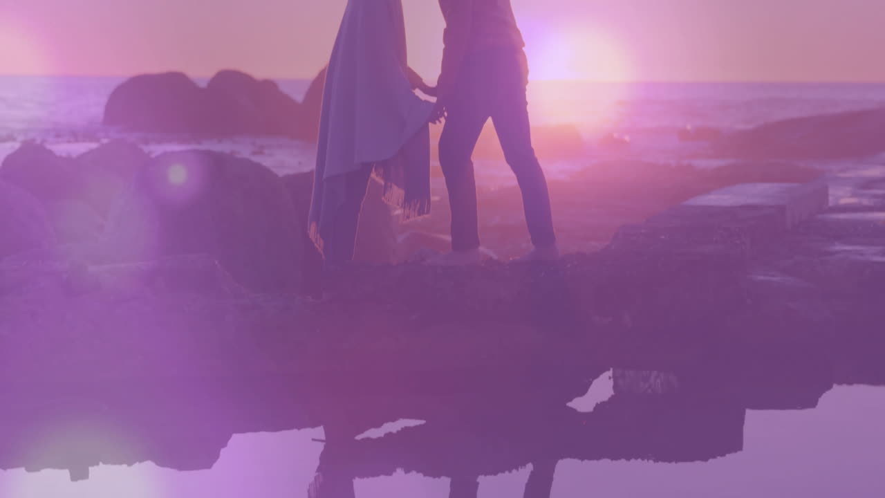 바가에서 키스하는 두 인종의 커플에 대한 밝은 점의 애니메이션