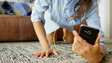 attractive woman listening music on mobile phone 4k