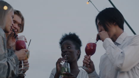 friends celebrating on a rooftop