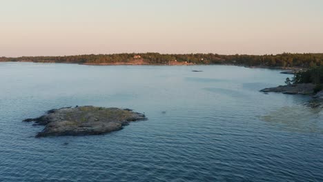 drone shot of stockholm archipelago in sweden during sunset