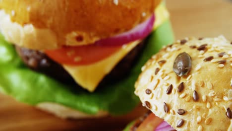 two hamburgers on table