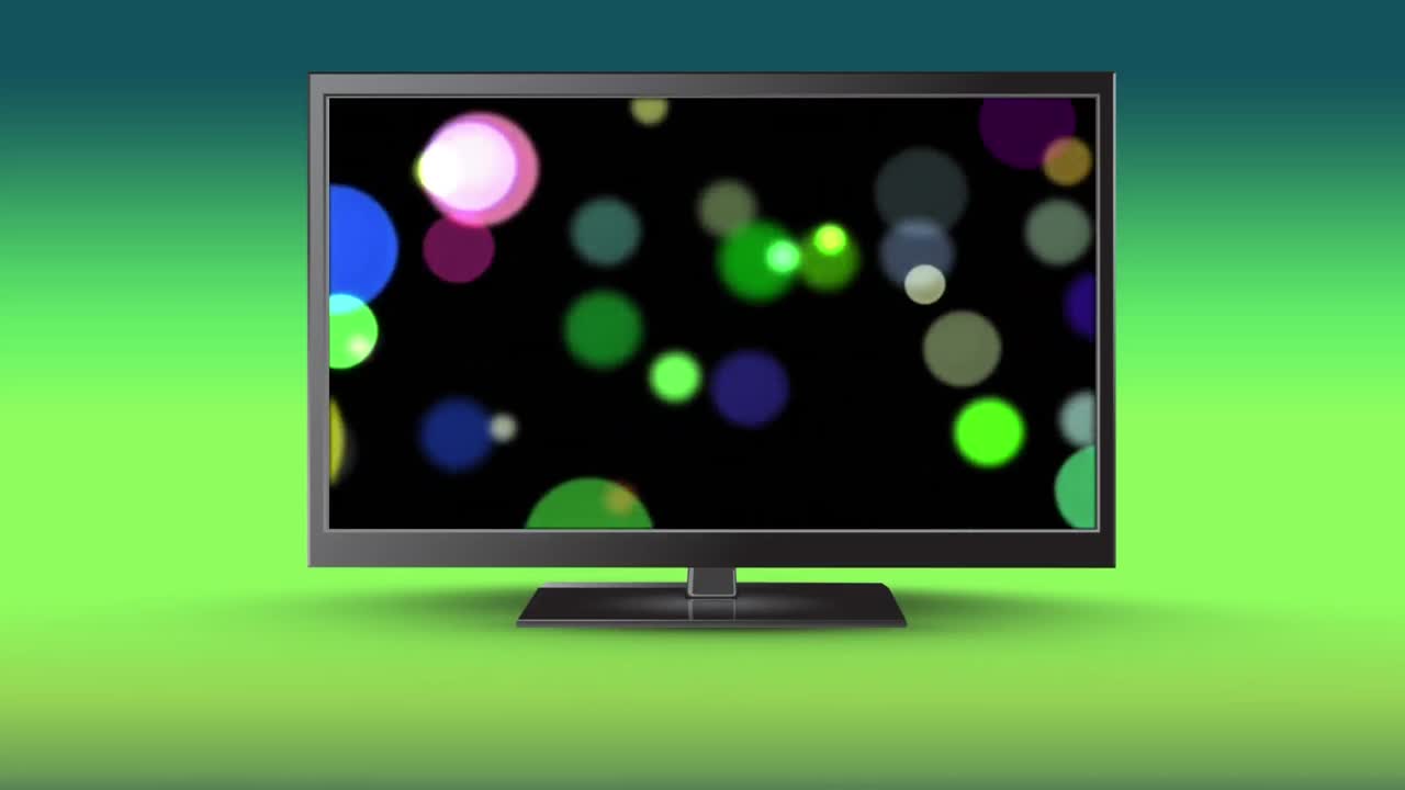Television with bokeh lights on its screen