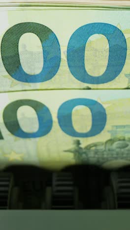 counting euro banknotes