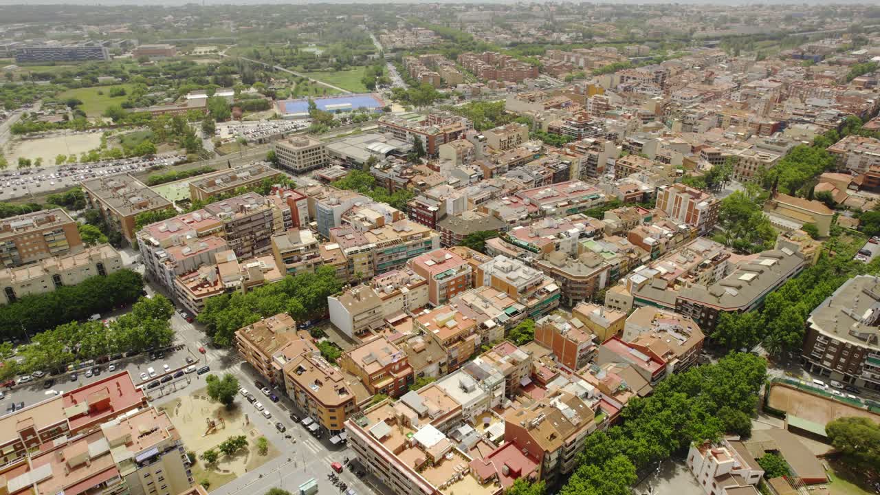 Aerial View of a Densely Populated Urban Area with Buildings and Green Spaces