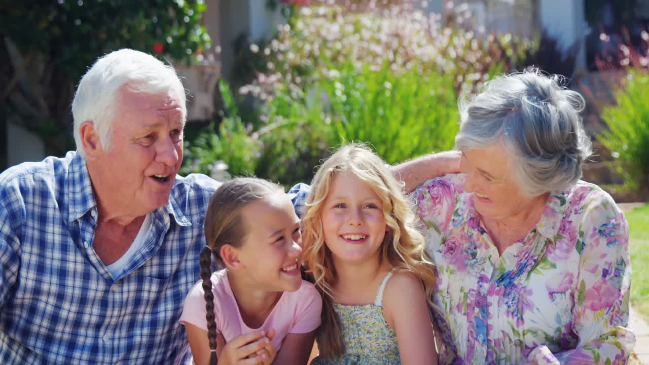 Happy grandparents with granddaughters