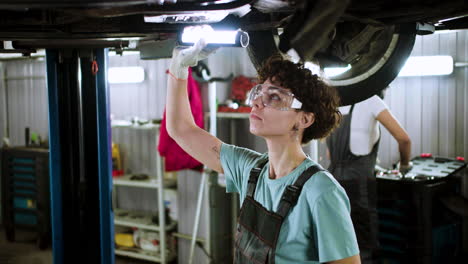 Woman-inspecting-automobile