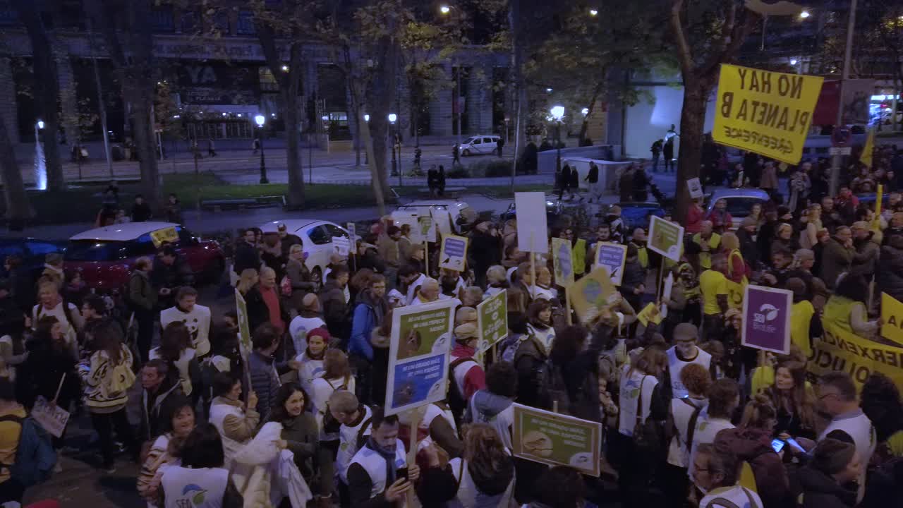 Panoramic shot of people protesting because of climate change in Madrid
