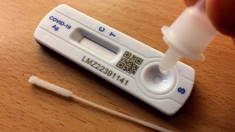 Covid-19-Positive-Lateral-Flow-Test-with-Swab