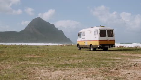 vintage van on a coastal landscape