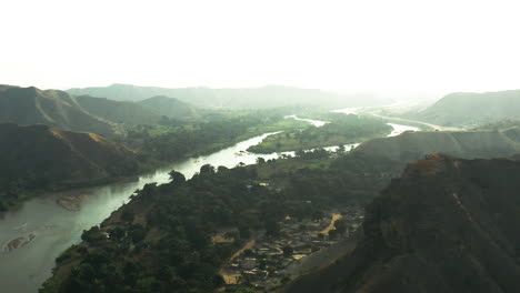 Flight-over-the-Catumbela-River,-Benguela,-Angola-Footage-with-Drone,-120-fps