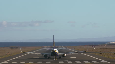 aircraft take-off runway with view to sea and mountains