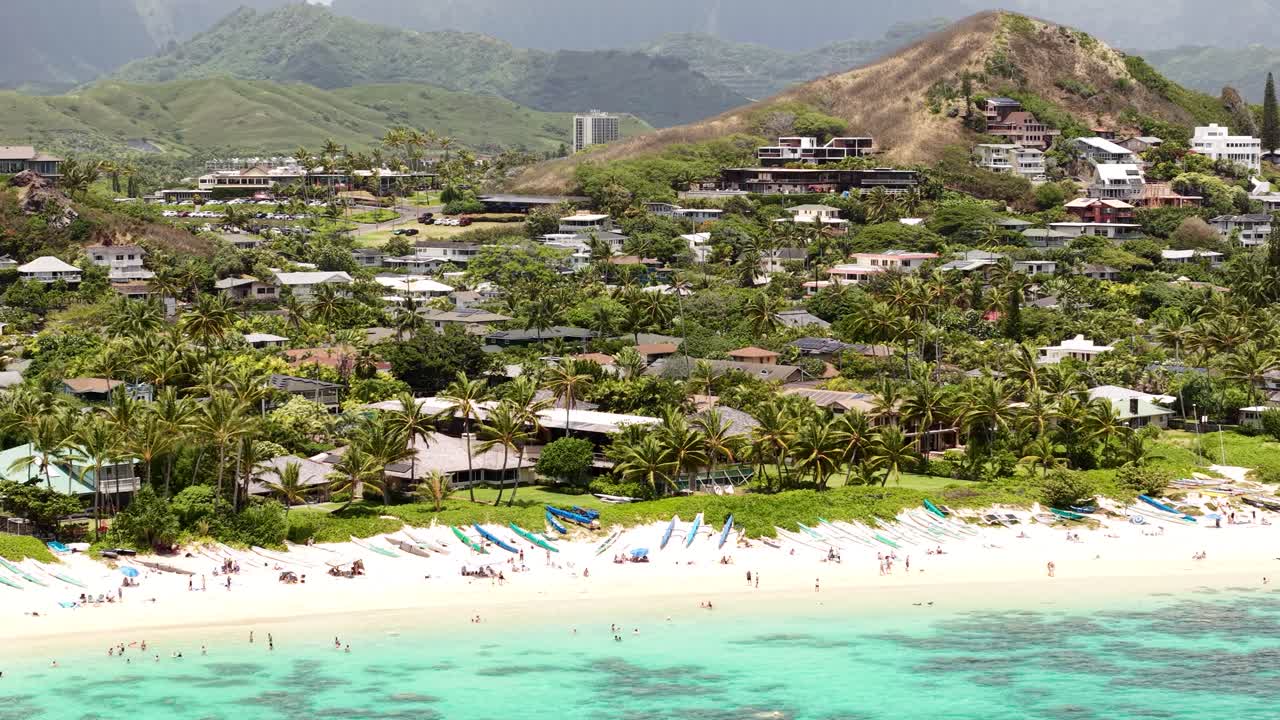 Kailua, Hawaii USA. Drone Shot of Lanikai Beach, Parasailing Parachute, People and Beachfront Properties