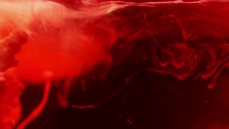 Red-ink-swirling-in-water