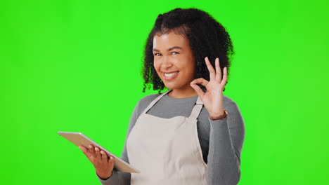 Tablet,-happy-and-woman-in-studio-with-green
