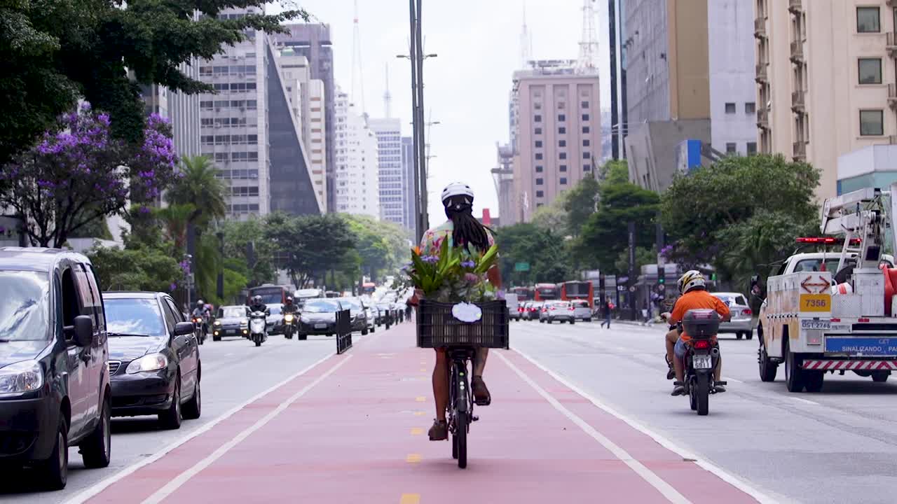 Cyclist Riding on a Dedicated Bike Lane in Sao Paulo, Brazil