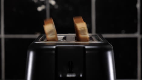 slices of bread coming out of toaster