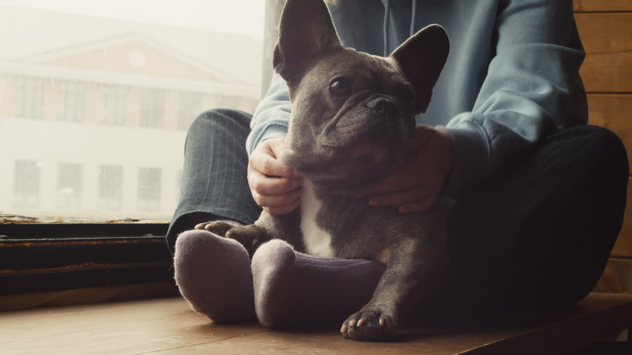 Man Talking On Cellphone While Working With Laptop Computer At Cafe While Waiter Taking Order From Woman Behind Him
