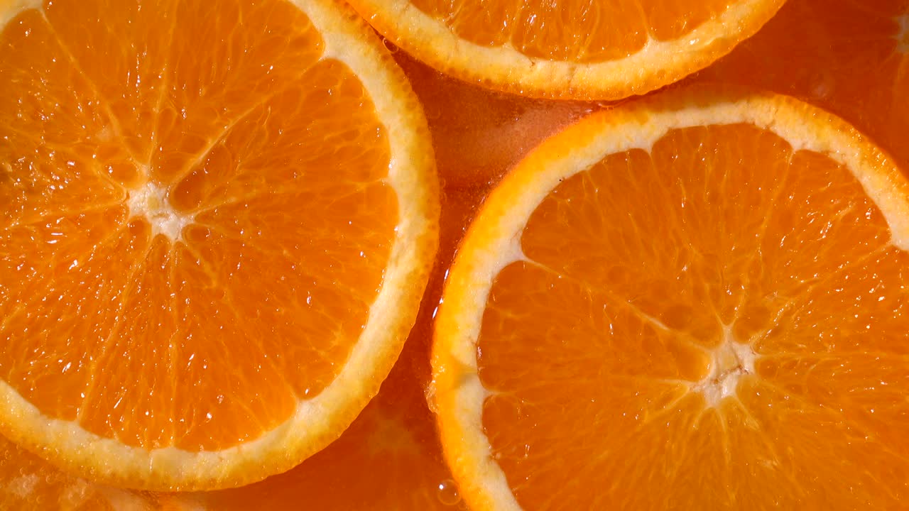 vista superior una rebanada de naranja en refresco, fruta para la dieta y la comida saludable
