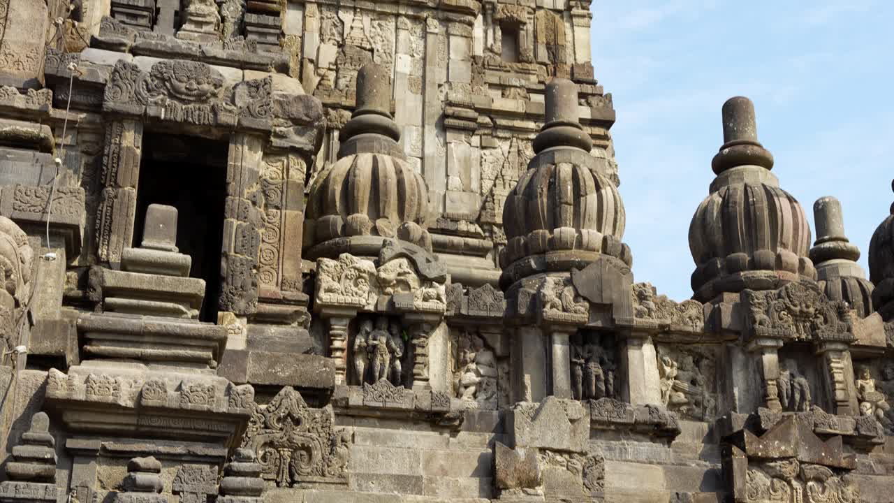 Detailed views of ancient carvings and statues at Prambanan Temple, Yogyakarta, Indonesia