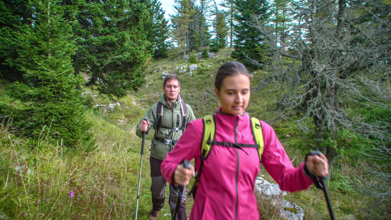 Active Young Couple Hiking On Path Through Mount St Ursula National Park, Slovenia