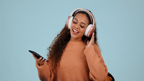 dancing, phone and a student woman with headphones