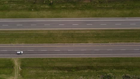 cars driving on route in rural area