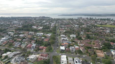 Aerial-view-of-luxury-neighborhood-residential-homes-and-roads-from-above