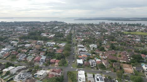 aerial view of luxury neighborhood residential homes and roads from above