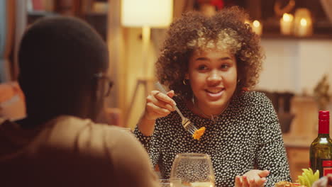 Woman-Enjoying-Dinner-With-Friends