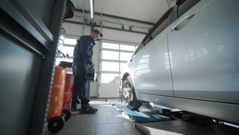car wheel alignment service in garage