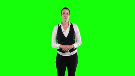 Animation-of-a-Caucasian-woman-in-suit-talking-in-a-green-background