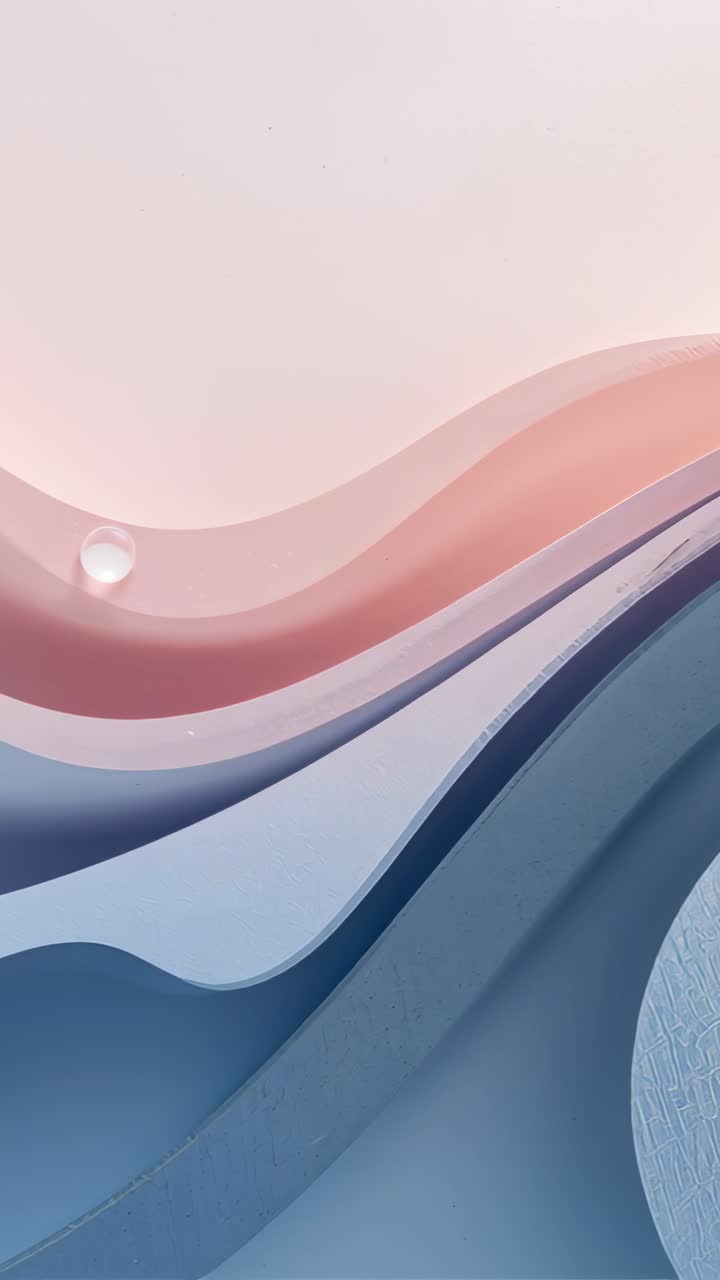 Vertical video: Rolling glossy bead sliding right down crest of pastel waves, passing textured disc