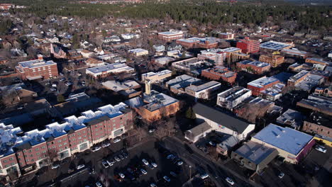 flagstaff arizona usa, drone shot of downtown buildings on sunny winter day