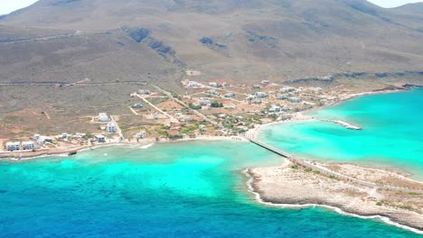 Aerial-view-of-bridge-connecting-island-to-the-mainland-in-the-mediterranean-sea