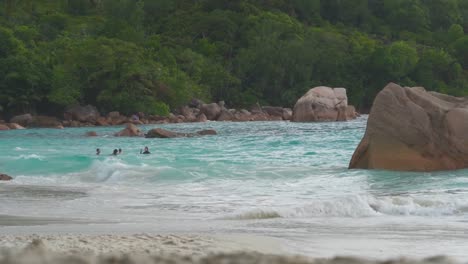 beach on praslin island seychelles with boulders