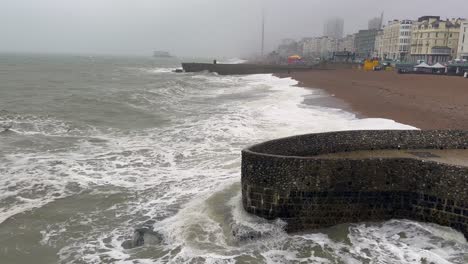 capturing the raw elements on an overcast day this footage scans brighton beach where high winds whip up crashing waves