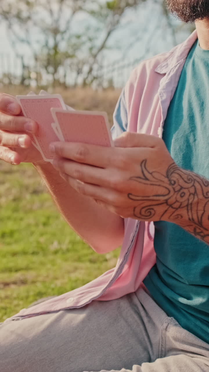 Friends Playing Cards at a Sunny Picnic
