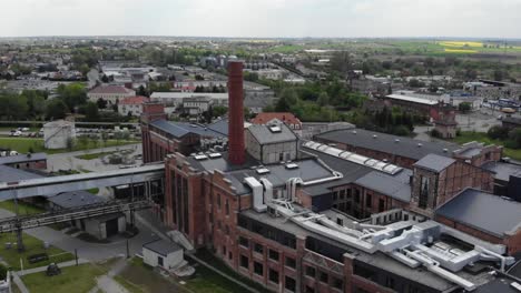 Aerial-orbit-shot-of-the-Arche-Hotel-Żnin-inside-old-sugar-factory-in-Poland