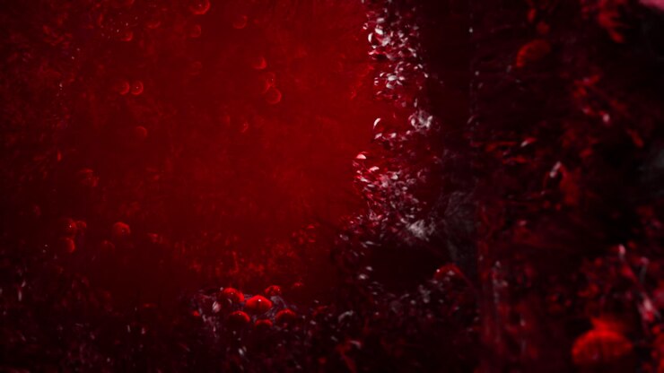 Abstract red background with glowing particles