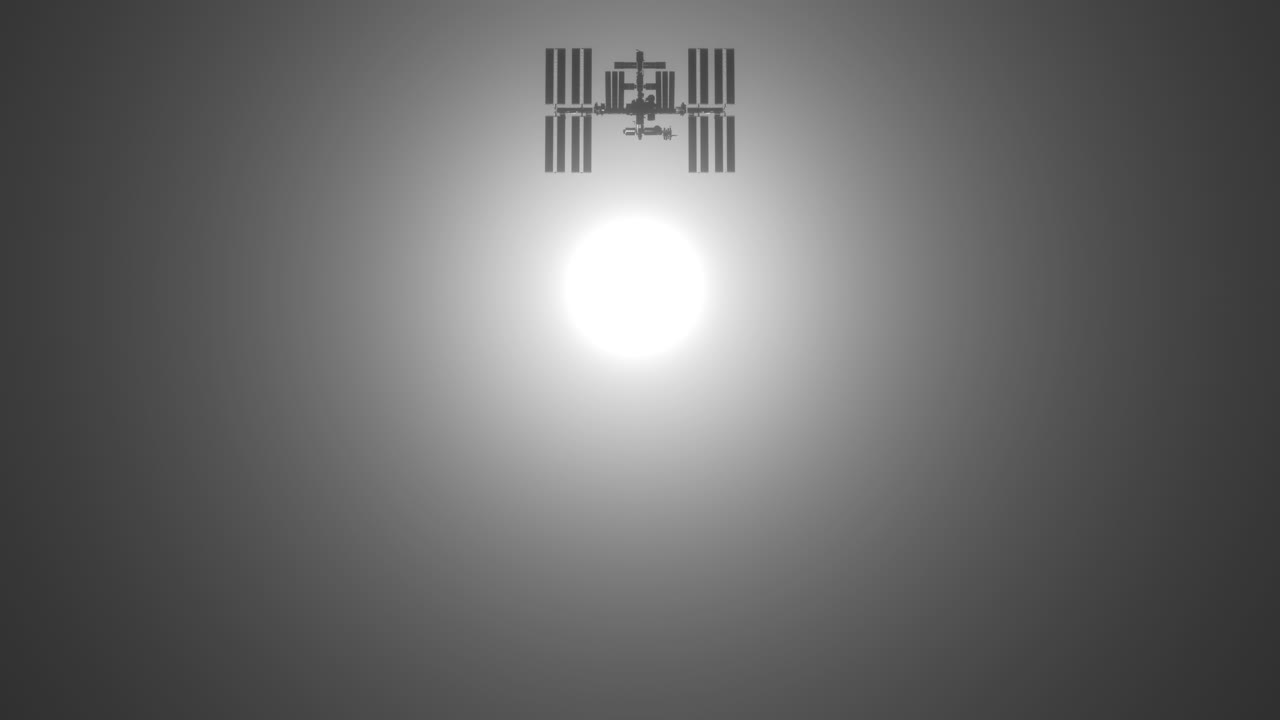 ISS International Space Station Passing Across Face of Sun with Dark Silhouette with Rich Glow from Star