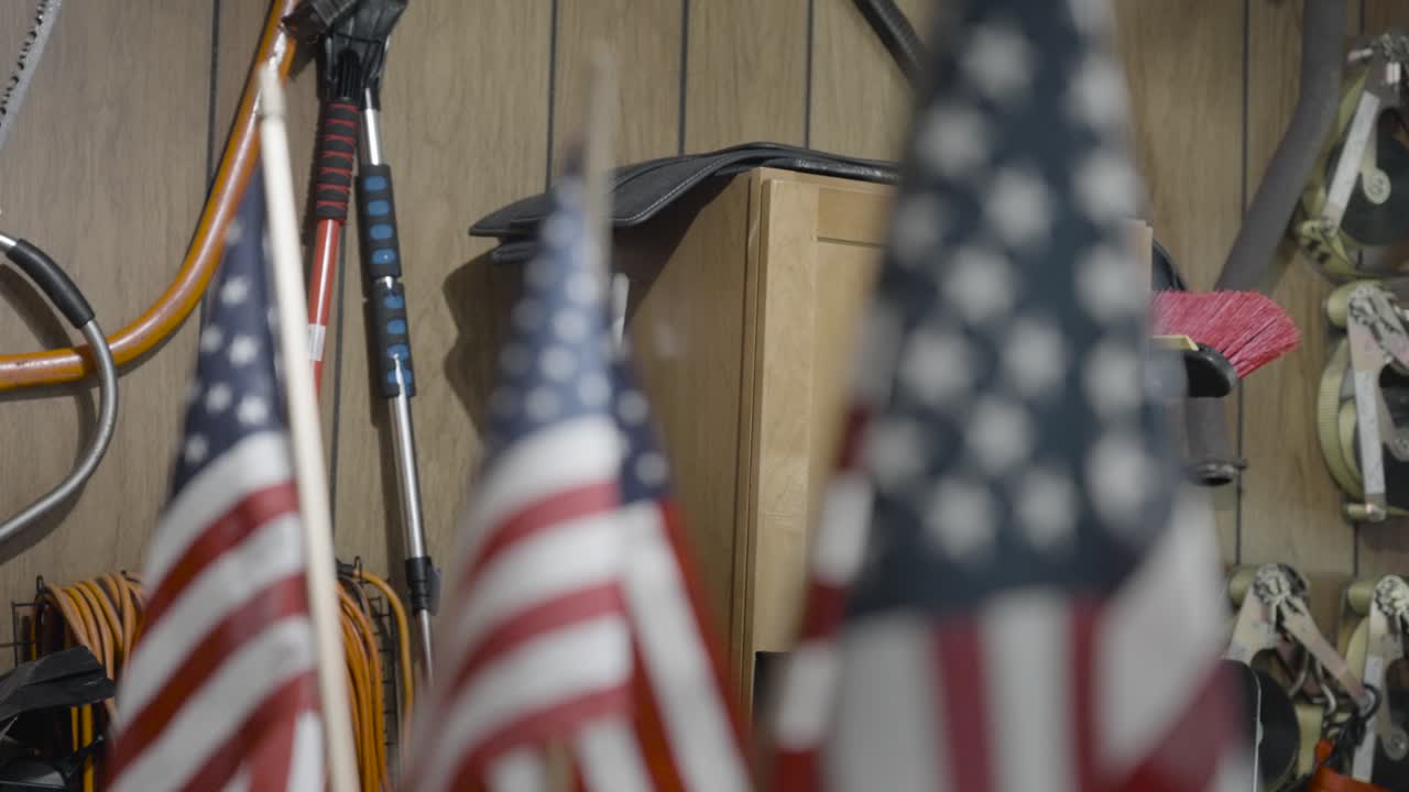 Lawn flags for memorial day in a vise grip