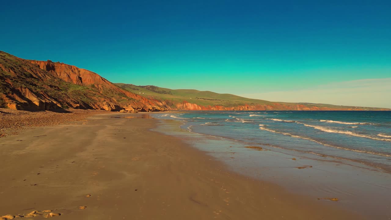 Aerial view of seascape along the vast beach on the South Coast during summer