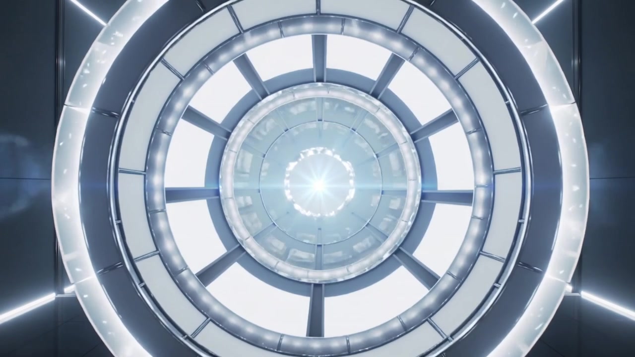 Luce centrale che si alza spingendo anelli metallici che si ritirano verso l'interno in una camera chiusa, rivelando raggi.