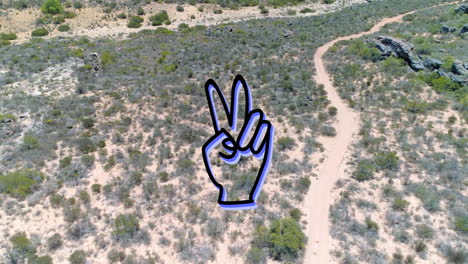 animation of peace gesture over landscape