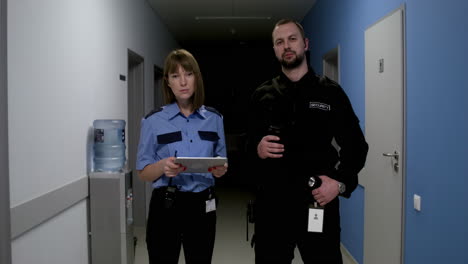 Team-in-uniform-posing-on-the-corridor