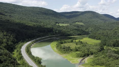 Drone-4K-video-flying-northeast-over-the-west-branch-of-Delaware-rive-upstream-of-the-Cannonsville-Reservoir,-in-the-Catskill-mountains