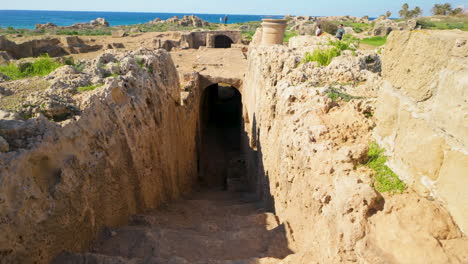 A-well-preserved-underground-passage-at-the-Tombs-of-the-Kings,-showcasing-the-architectural-ingenuity-of-ancient-tomb-builders